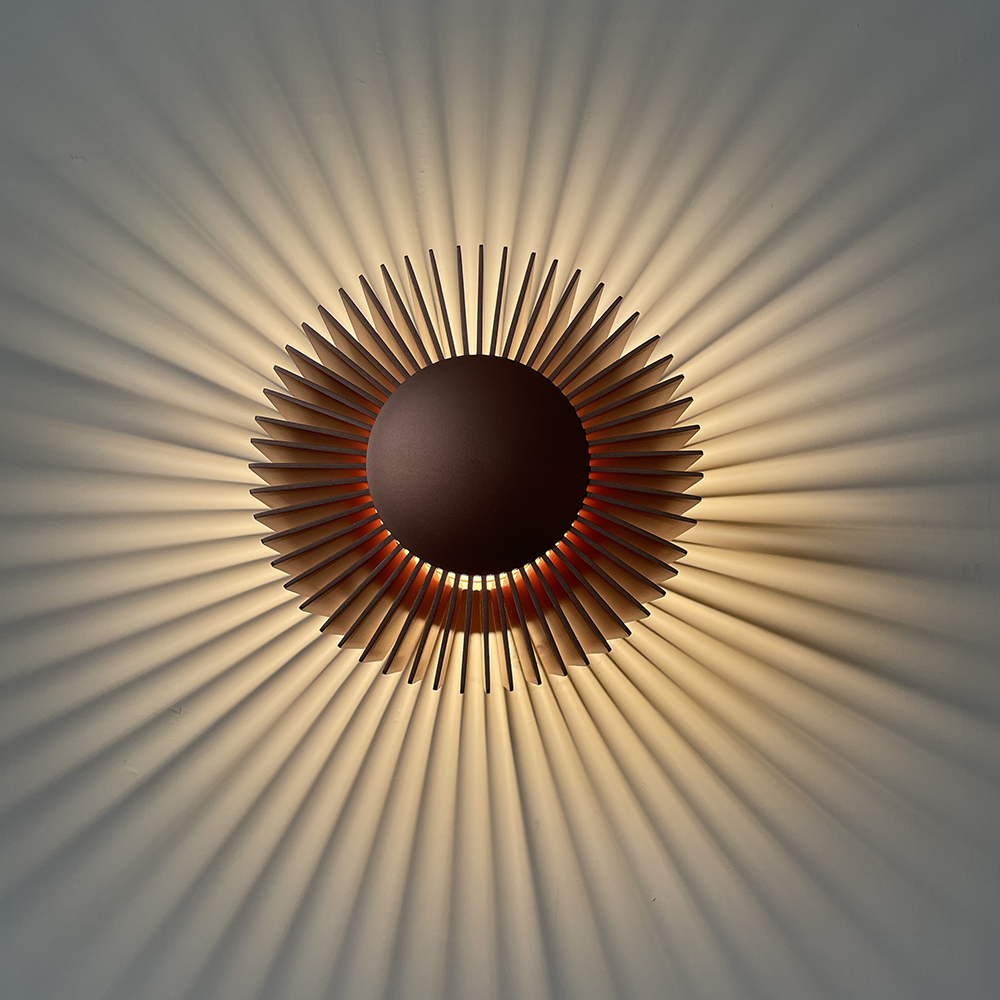 Close-up of the Elegant Industrial Flower Wall Lamp highlighting its copper frame and glass lampshade.
