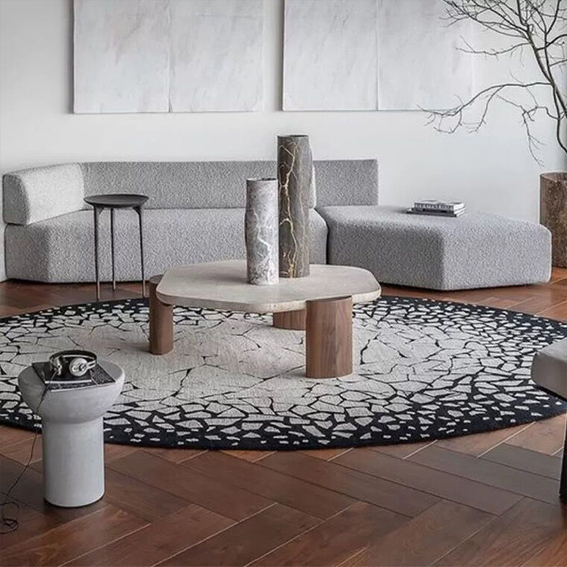 Front view of the Nordic Elegance Marble Coffee Table featuring its unique pebble shape.