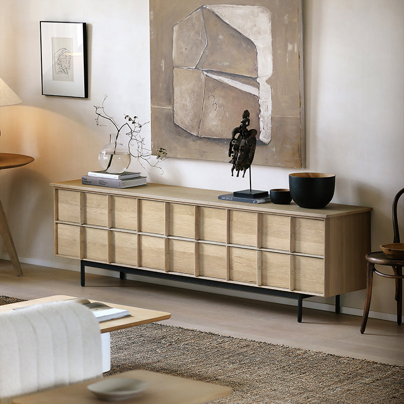 Front view of the elegant solid oak TV stand showcasing six drawers and cable management features.