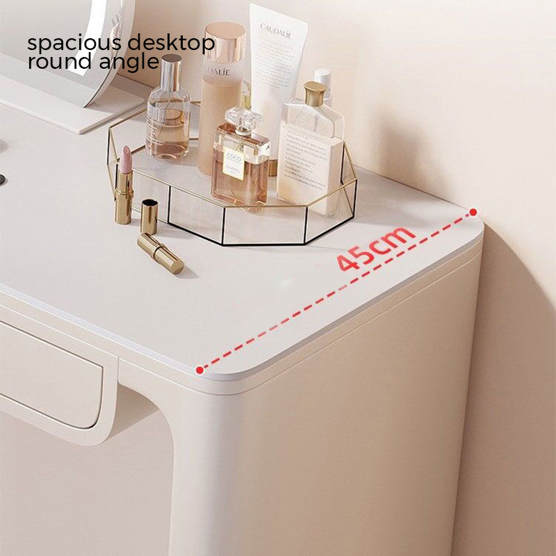 Side angle of the makeup vanity demonstrating its ample storage drawers and chic appearance.