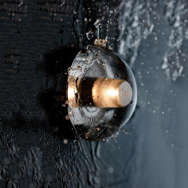 Close-up of the elegant LED dome-shaped wall lamp showcasing the crystal design