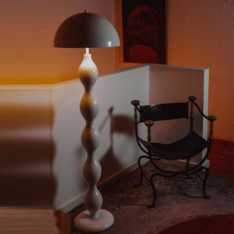 The LED mushroom floor lamp illuminating a modern foyer with its soft glow.