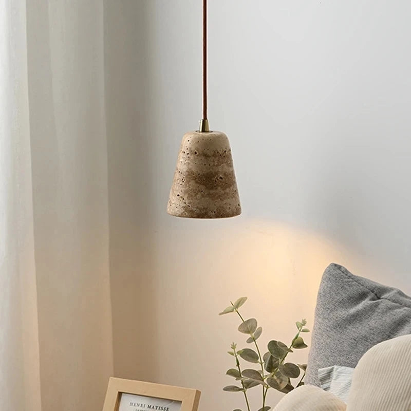 Elegant Nordic Yellow Marble Pendant Light illuminating a cozy dining area.