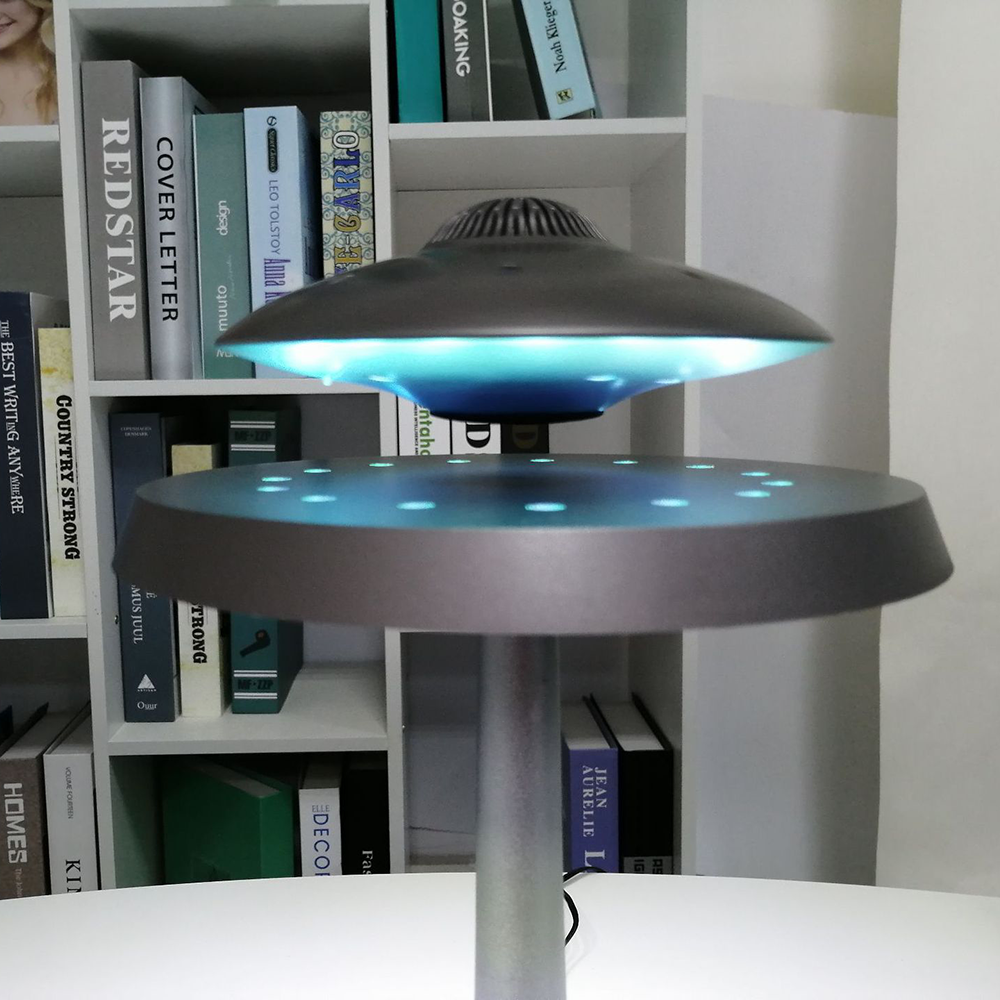 Close-up of the touch control base of the smart lamp, highlighting its modern features.