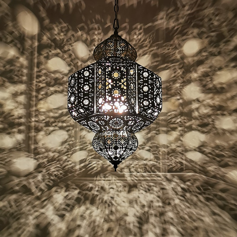 Close-up of the Moroccan style vintage hollow carved pendant light showcasing intricate metalwork.