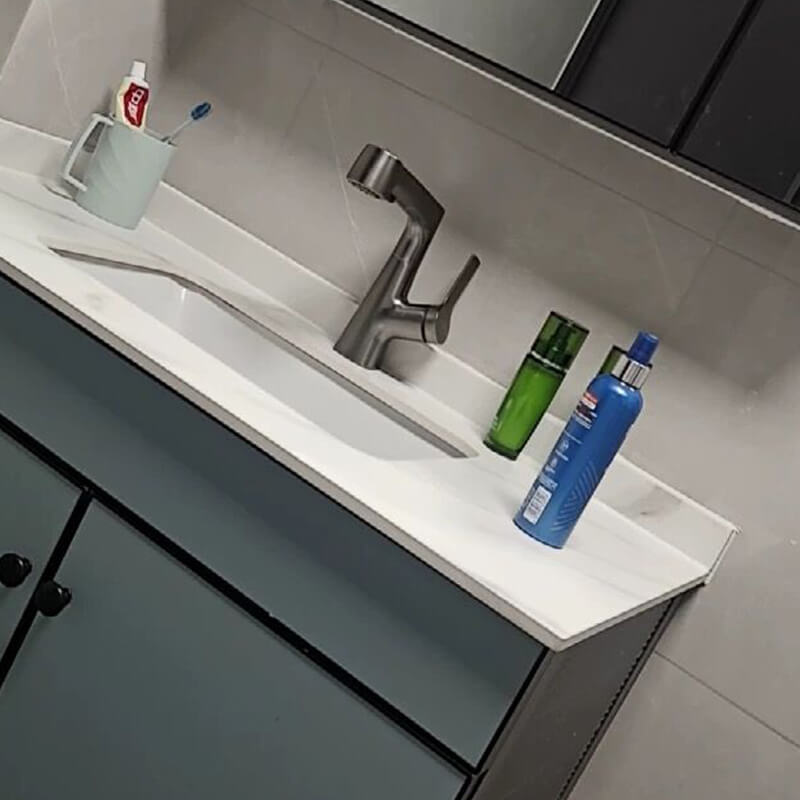 Close-up of temperature controller on retractable faucet with sleek brass detailing