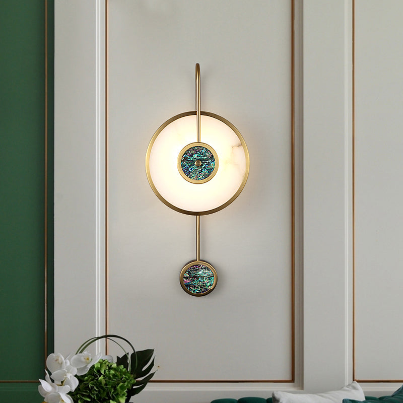 Elegant gold copper wall sconce showcasing its sophisticated design in a modern living room.