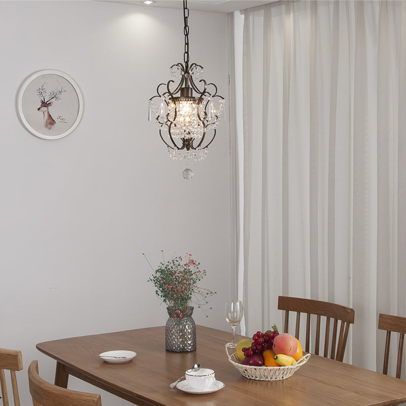 Elegant mini geometric crystal chandelier showcasing stunning light patterns in a cozy living room.