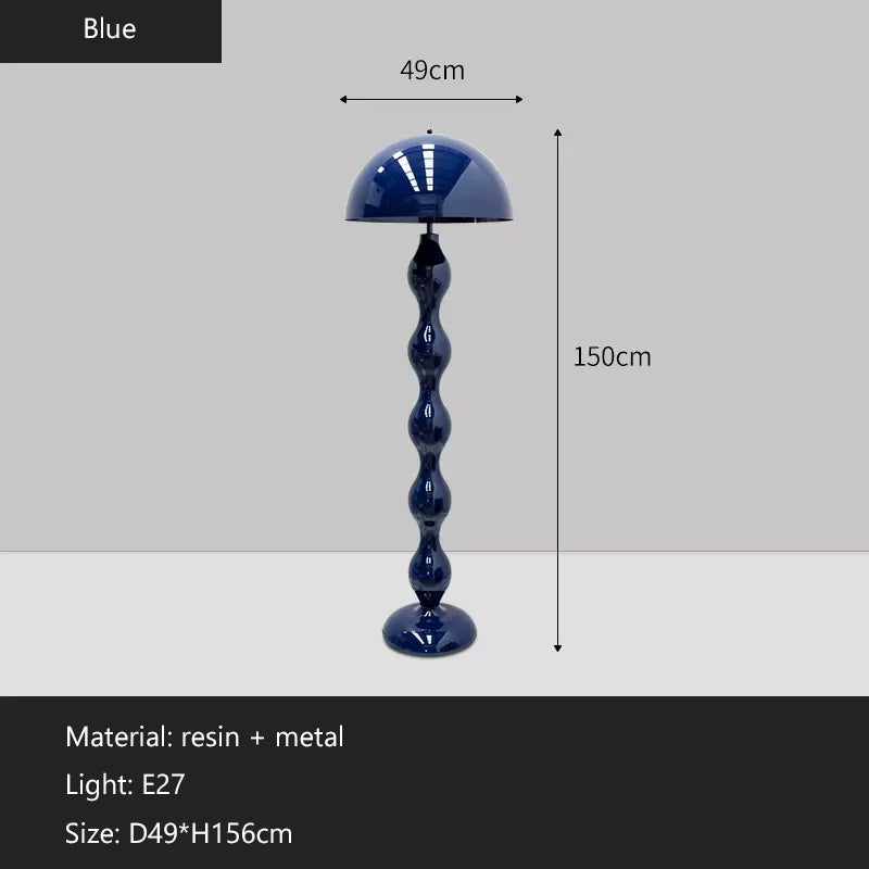 The LED mushroom floor lamp illuminating a modern foyer with its soft glow.