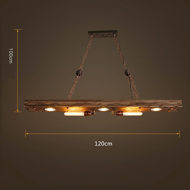 Close-up of the Heritage Glow wood pendant light highlighting its Edison bulb and industrial lighting finish