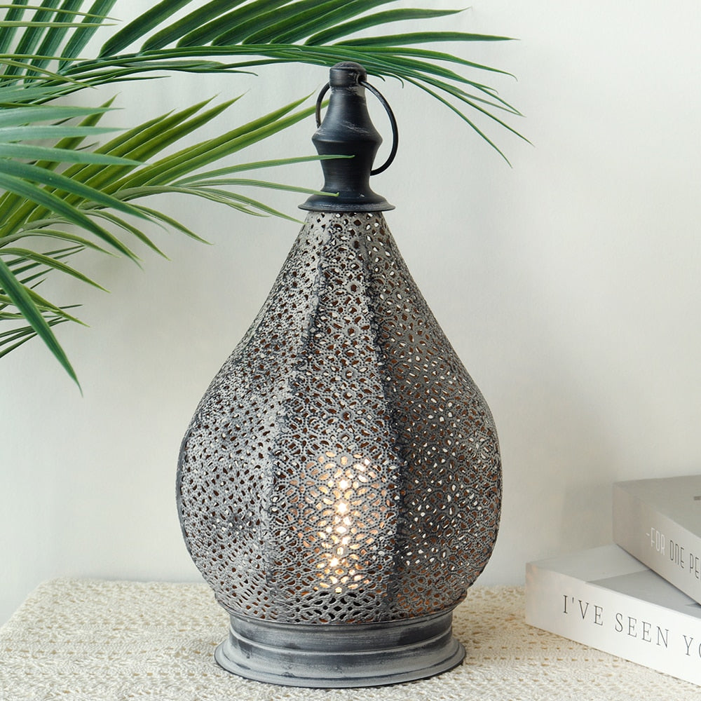 Elegant Moroccan style touch table lamp with fairy lights illuminated in a cozy setting.