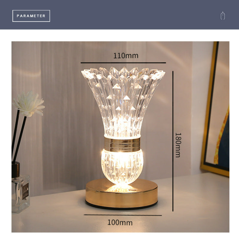 Elegant crystal vase LED table lamp showcasing flowers on a dining table.
