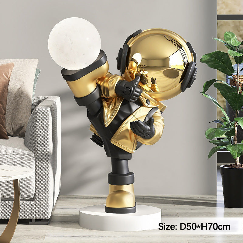 Close-up view of the Cosmic Kung Fu Astronaut floor lamp highlighting its intricate details and vibrant colors.