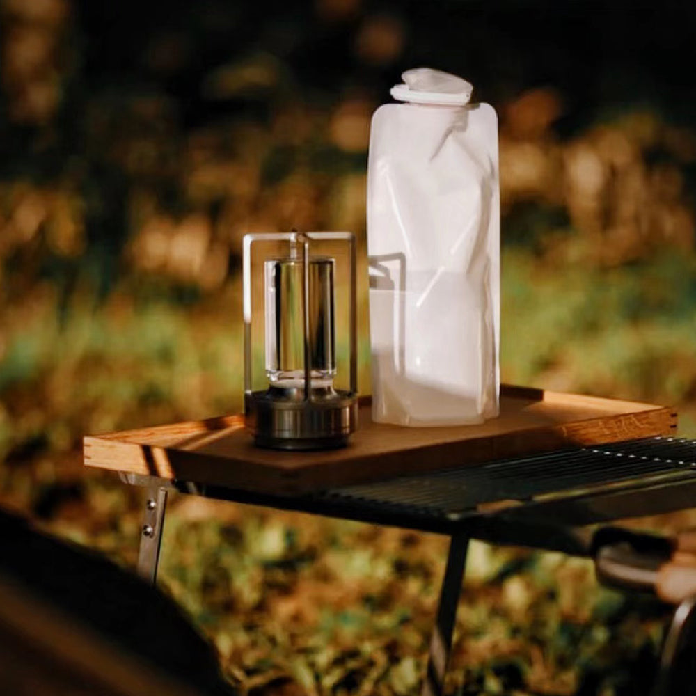 Elegant Rechargeable Touch Crystal LED Table Lamp showcasing its sleek design in a modern living room setting.