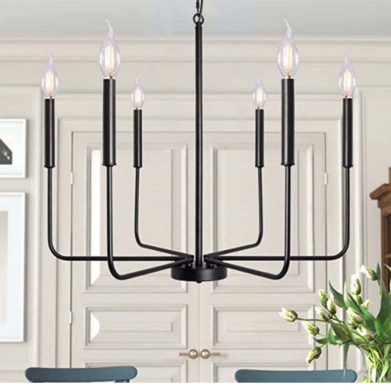 Close-up view of the Rustic Elegance Brass Candle Pendant Light highlighting its candelabra base and design.