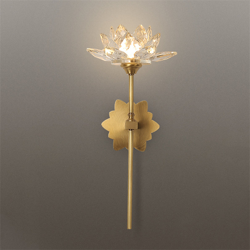 Close-up view of the clear glass shade of the Lotus Crystal Wall Lamp, highlighting its exquisite design.