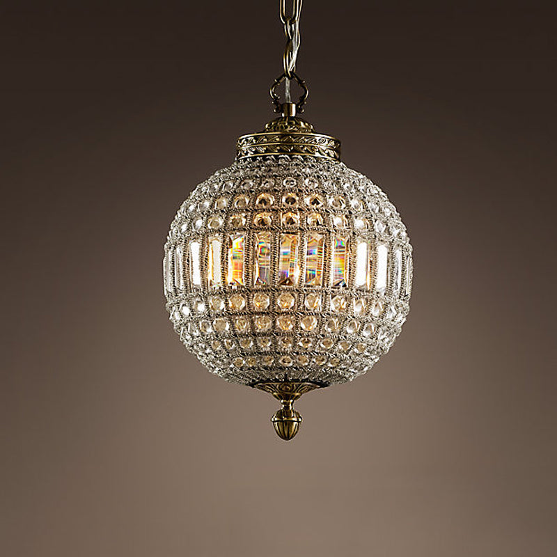 Elegant LED crystal pendant lamp in a cozy living room setting.