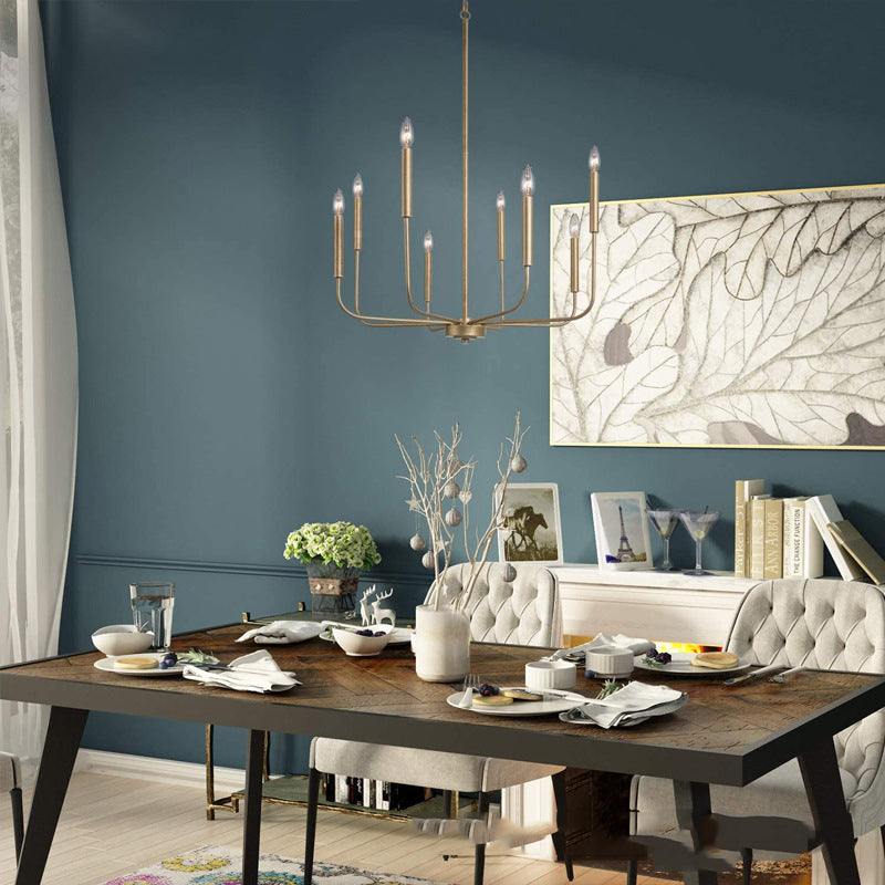 Close-up view of the Rustic Elegance Brass Candle Pendant Light highlighting its candelabra base and design.