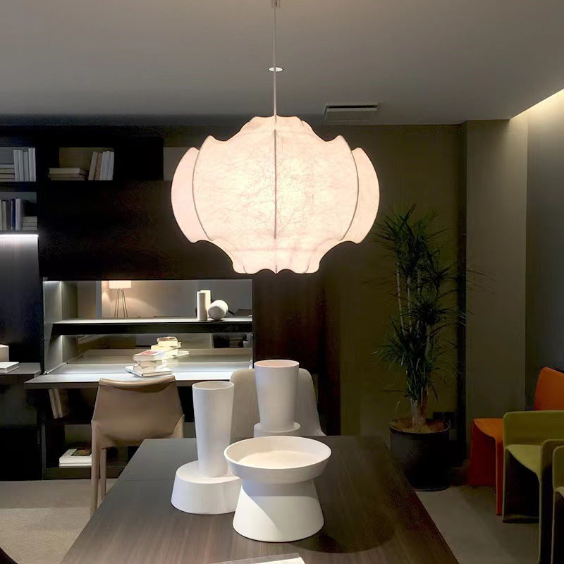 The Nordic silk lamp illuminating a stylish hotel lobby with its elegant glow.