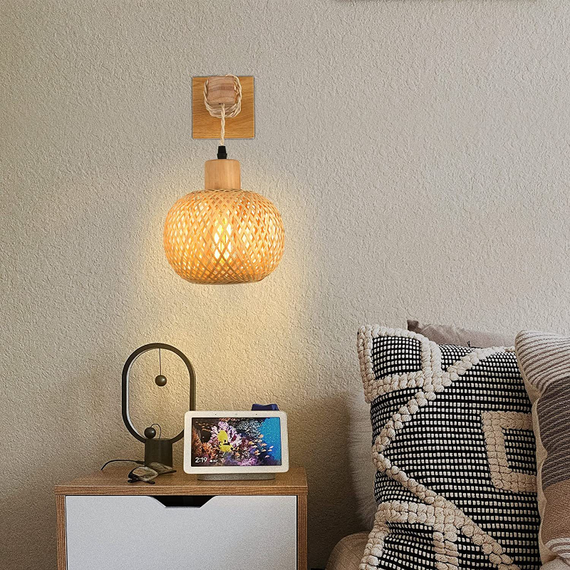 Bedroom interior featuring best rattan wall sconce for cozy decor ambiance