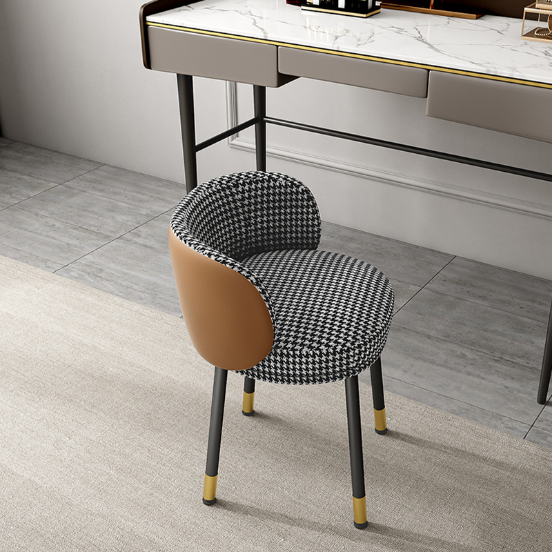 Chic fabric backrest makeup chair in grey leather, ideal for small spaces.