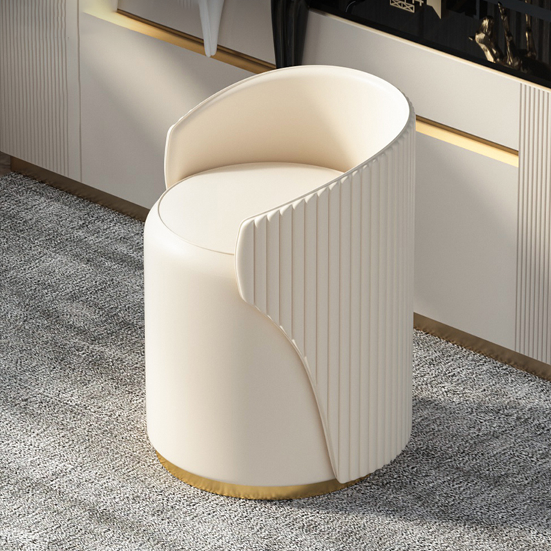 Chic boucle accent chair with a gold base, perfect for dressing tables.