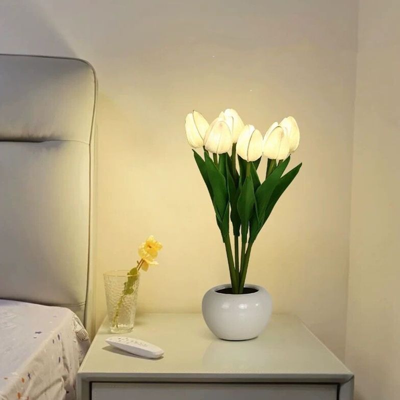 Elegant Tulip LED Table Lamp showcasing its soft glow and modern design from an angle.