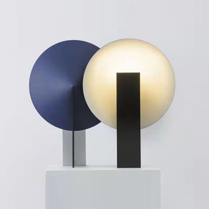 Elegant blue cone lamp showcasing its acrylic shade from a side angle