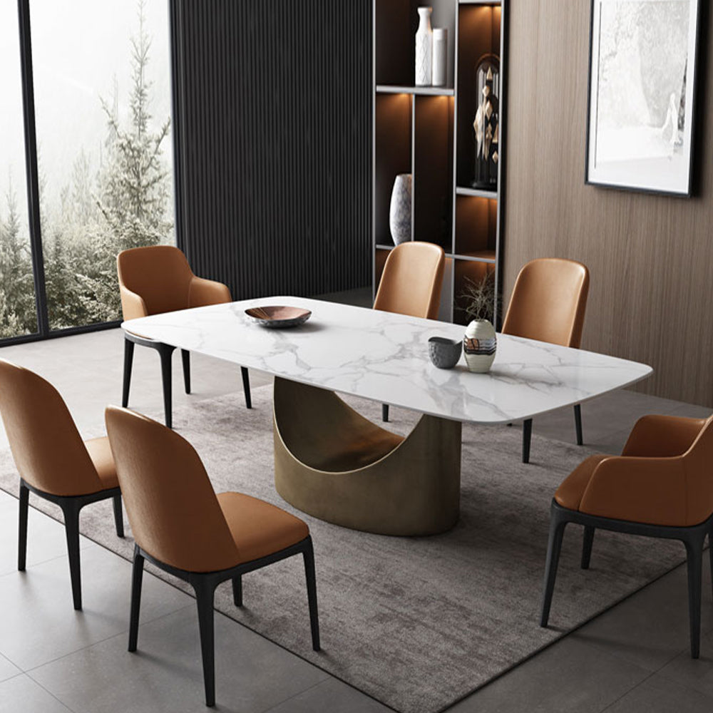 Elegant U-shaped base modern dining table with marble top, showcasing dining setup for family gatherings.