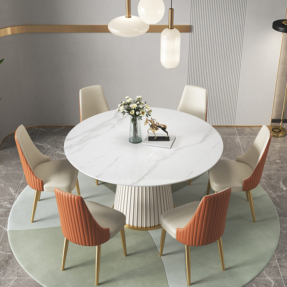 Side view of the round marble table showcasing pine wood leg and stainless base