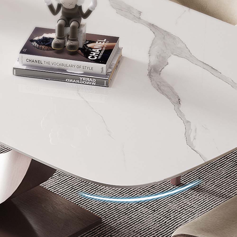Crescent moon-shaped base of the modern white dining table