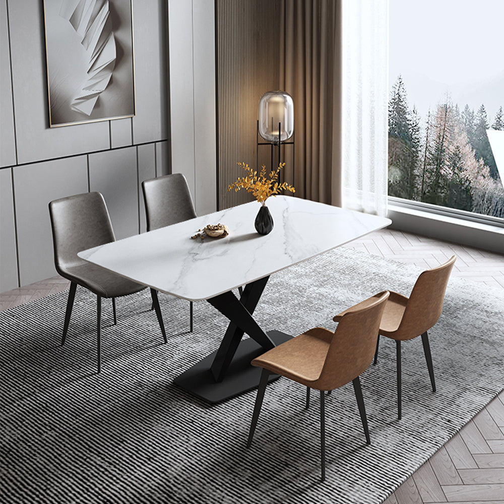 Top view of sintered stone dining table set for 8 with sleek white surface and black X-shaped legs