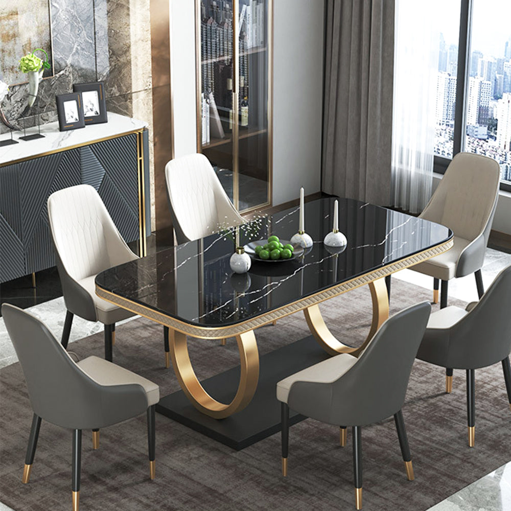 Luxury black marble dining table with dual-circle gold base, showcasing its elegant design and spacious surface.