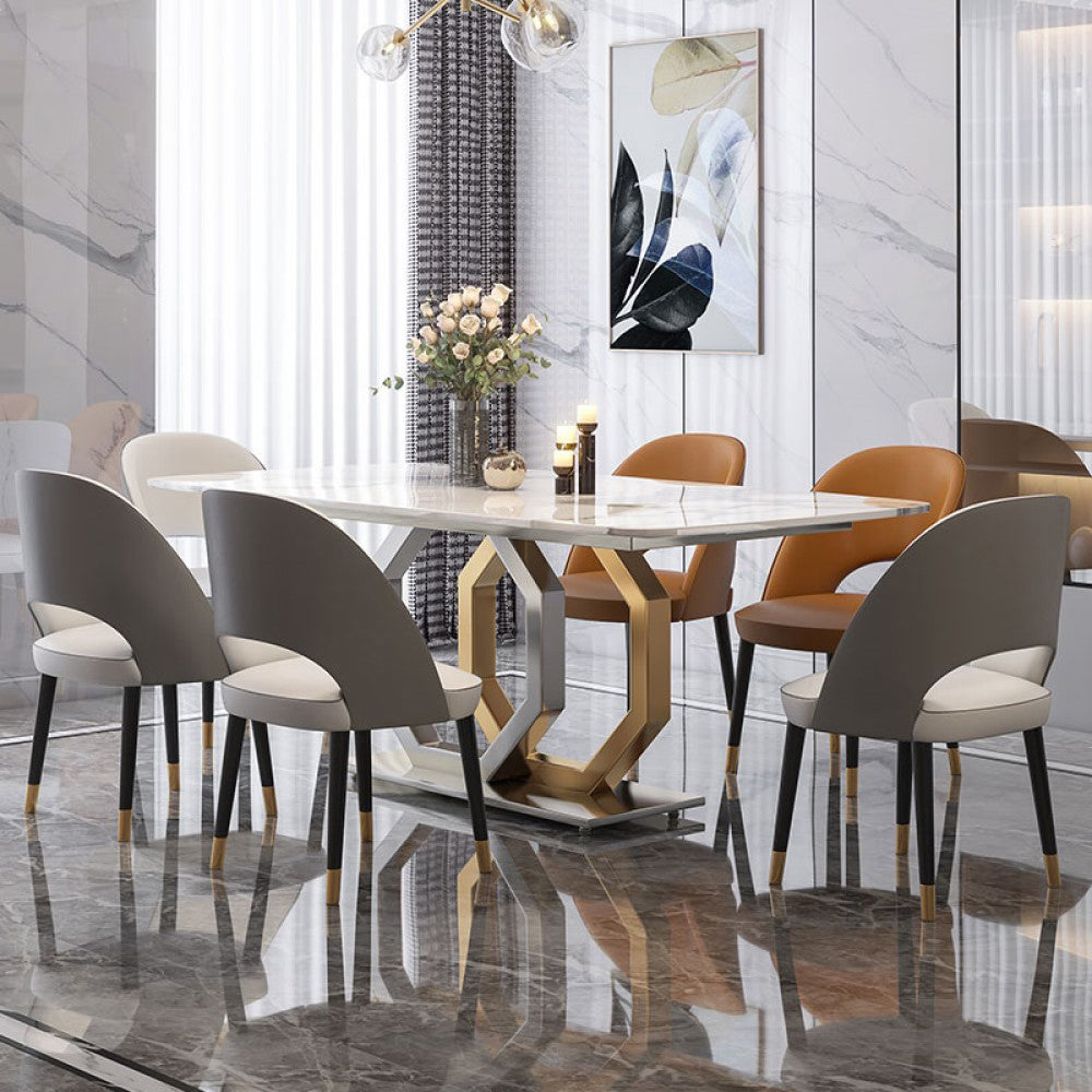 Elegant white marble dining table with steel legs, perfect for modern homes.