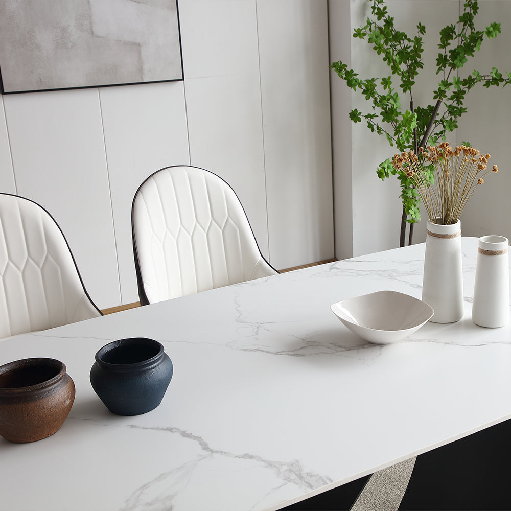 Family enjoying a meal at the butterfly dining table, highlighting its seating capacity and design.
