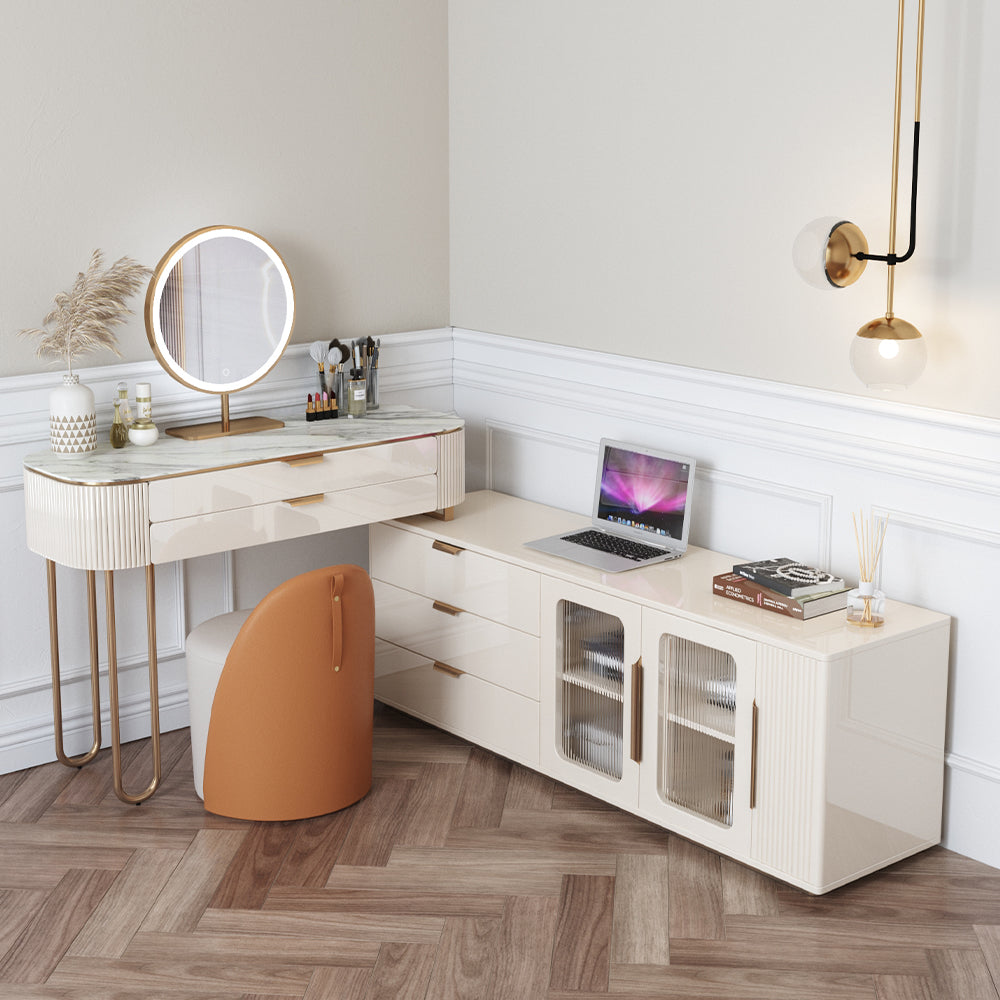 Elegant beige L-shaped makeup vanity set displayed in a cozy beauty room, highlighting its spacious drawers and mirror.