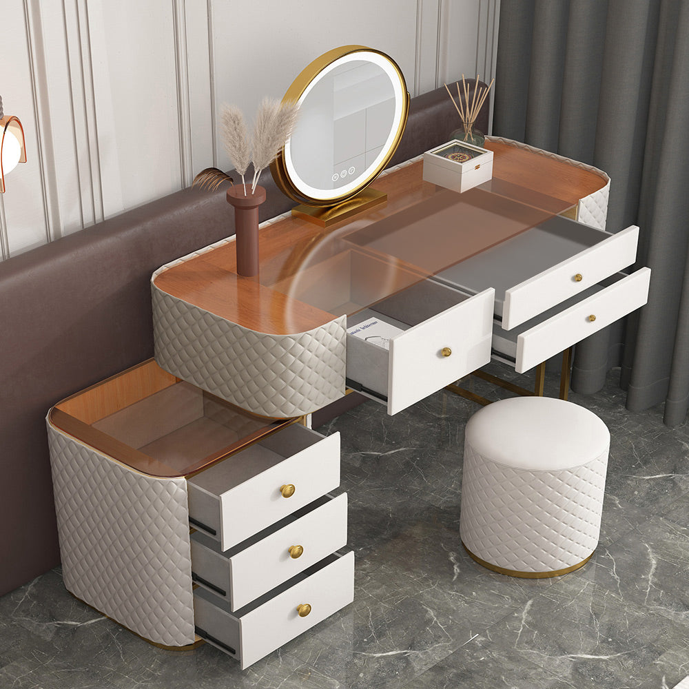 Elegant wooden makeup vanity set showcasing organized drawers and mirror.