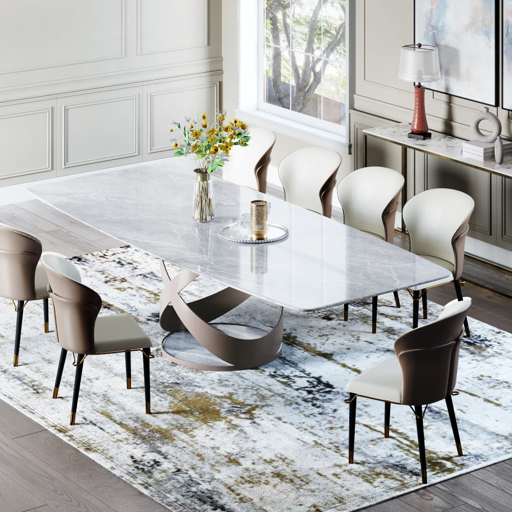 Close-up of the glossy gray marble surface of the dining table, highlighting its smooth finish.