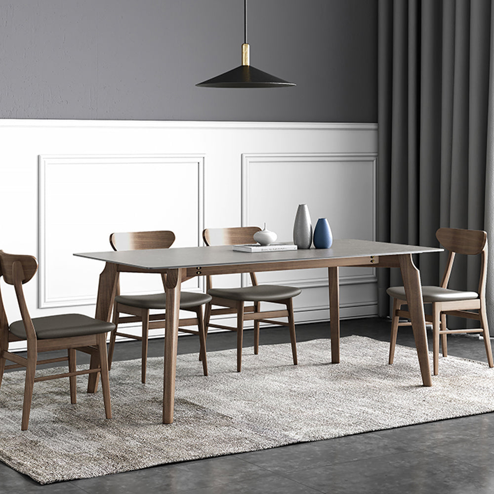 Elegant gray rectangular marble dining table viewed from above, showcasing its sleek design.