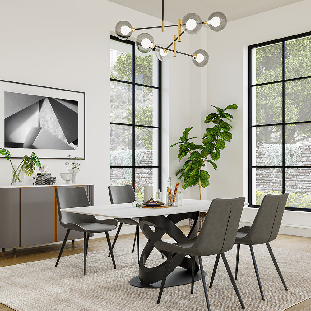 Sintered stone dining table showcasing the elegant white surface and geometric black base from a side angle.