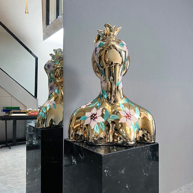 Close-up of the intricate details on the Electroplated Goddess Decor Sculpture.