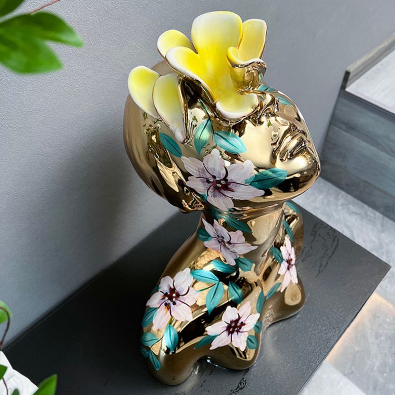Elegant display of the Electroplated Goddess Statue in a modern living room setting.