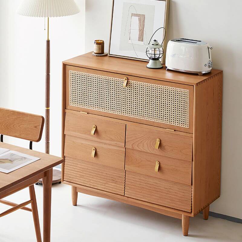 Cherry wood rattan sideboard cabinet showcasing the faux rattan weave and brass knobs.