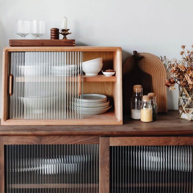 Elegant cherry wood sideboard cabinet showcasing glass doors and adjustable shelves.