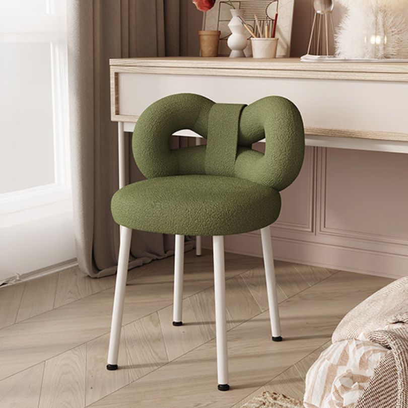 Noble Green Chic Modern Vanity Bow Stool displayed near a stylish dresser, highlighting its modern aesthetic.