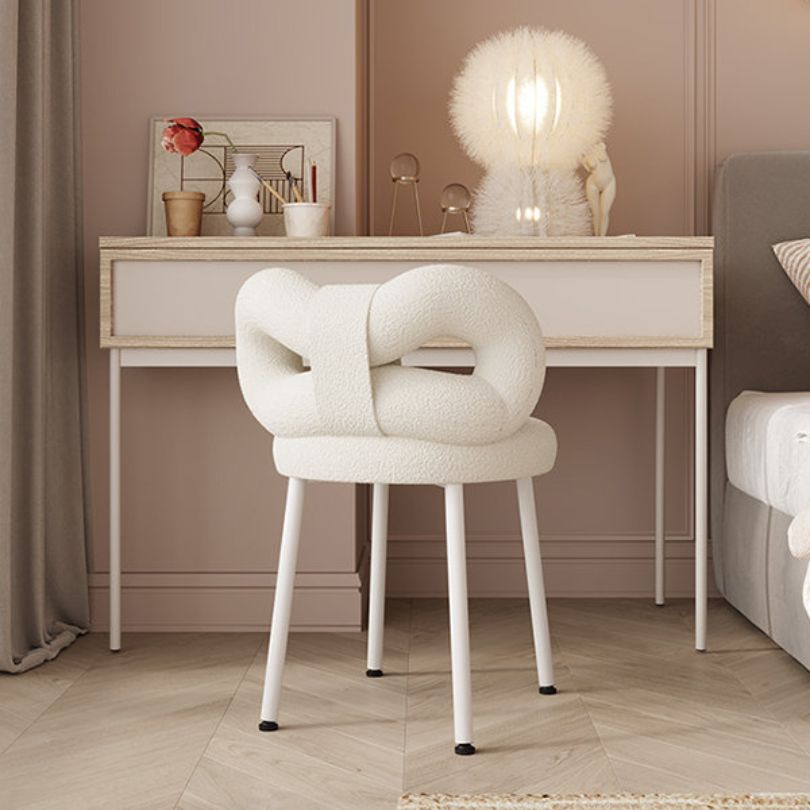 Pale Pink Chic Modern Vanity Bow Stool placed in a bright, stylish bedroom setting.