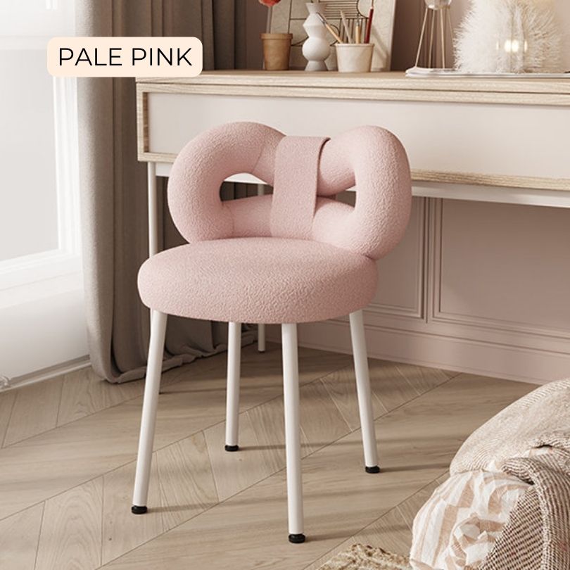 Noble Green Chic Modern Vanity Bow Stool displayed near a stylish dresser, highlighting its modern aesthetic.