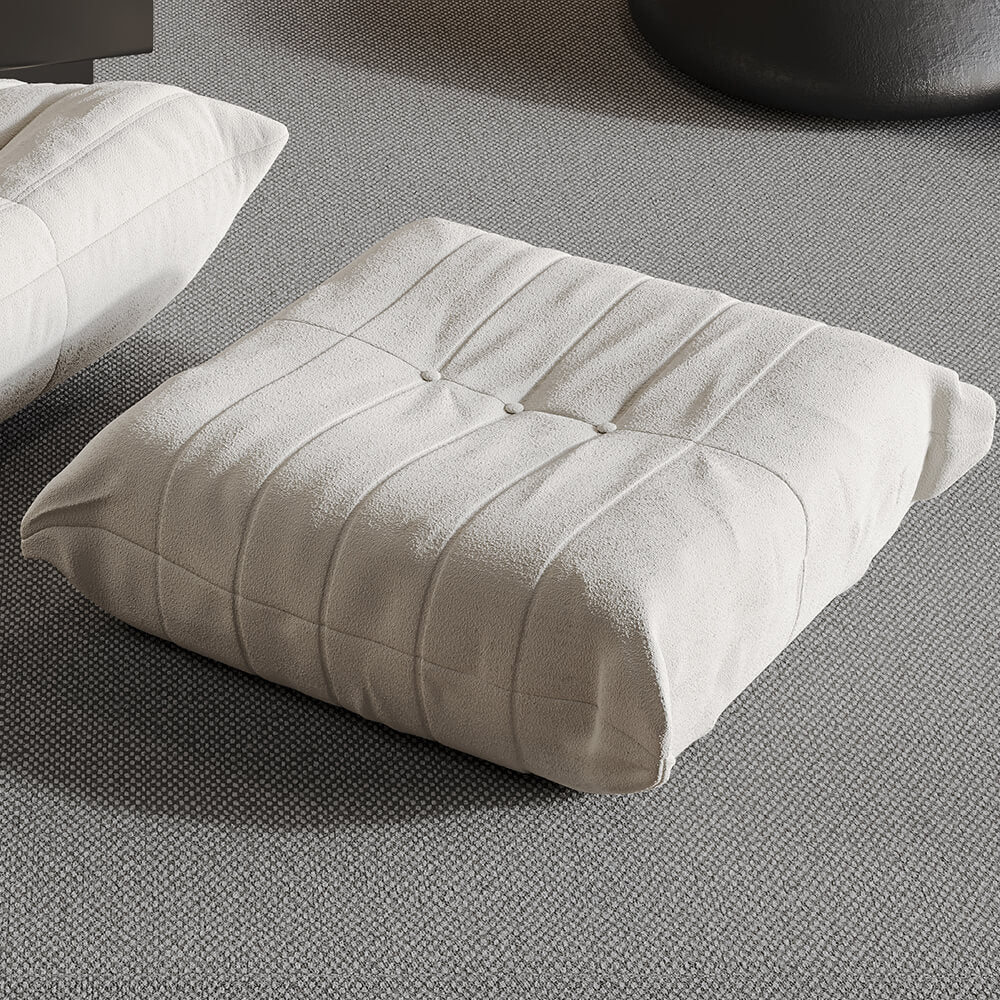 Chic beige upholstered ottoman showcasing soft lamb fleece from the front view