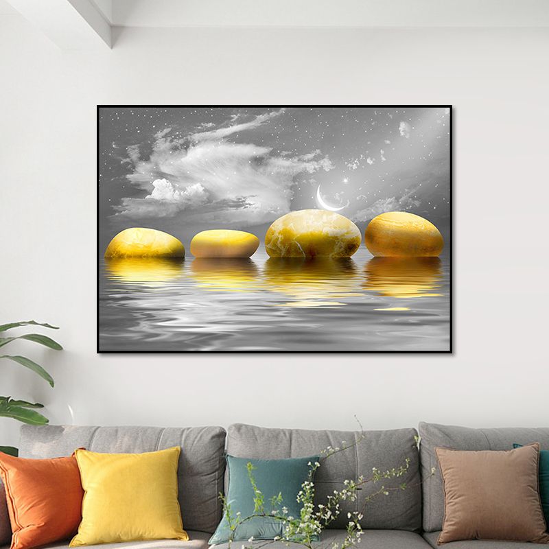 Close-up of elegant gold pebbles on grey canvas art, highlighting the texture and details.