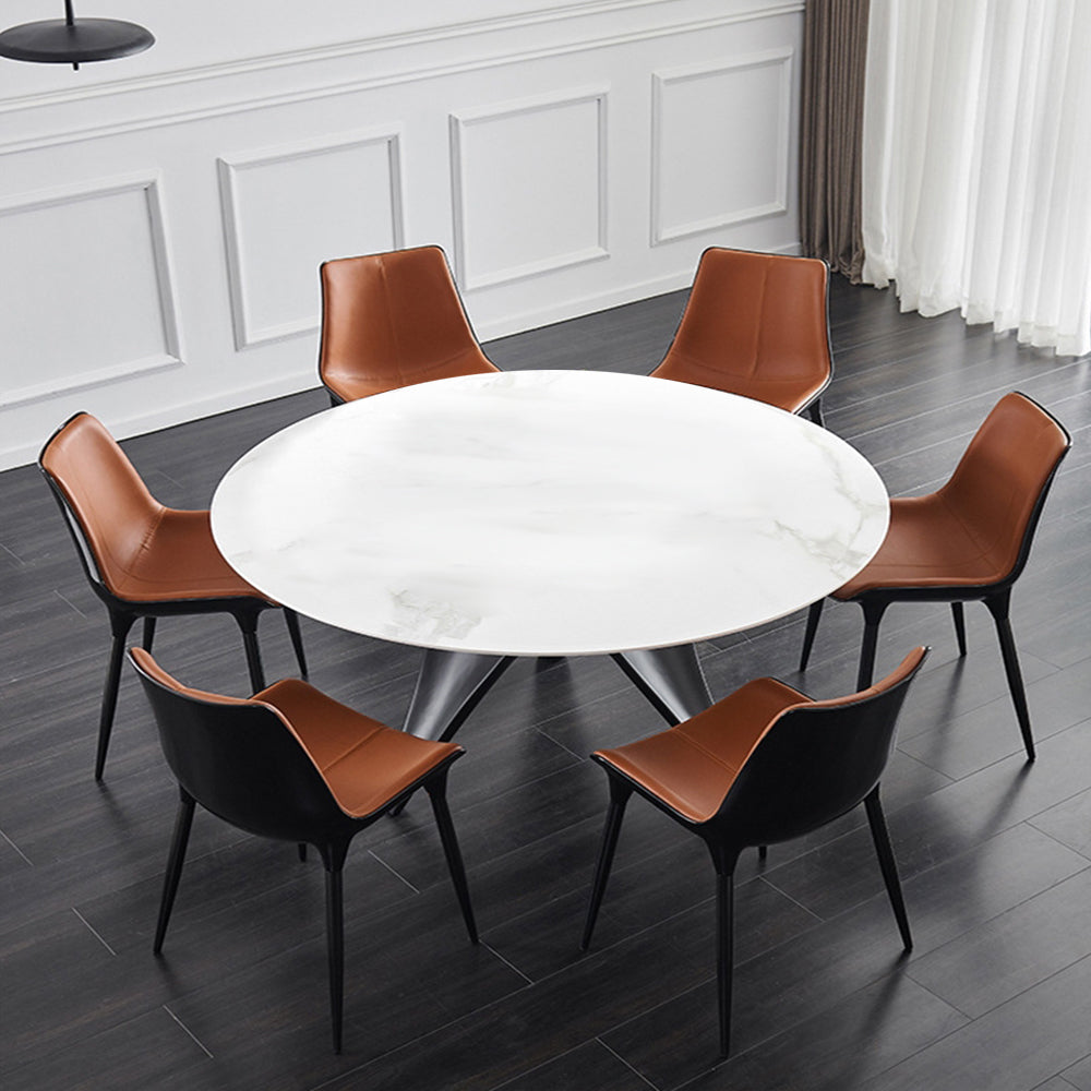 Elegant modern white round dining table viewed from the side, showcasing its fiberglass base.